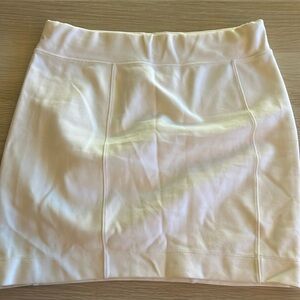 White Lacoste mini skirt